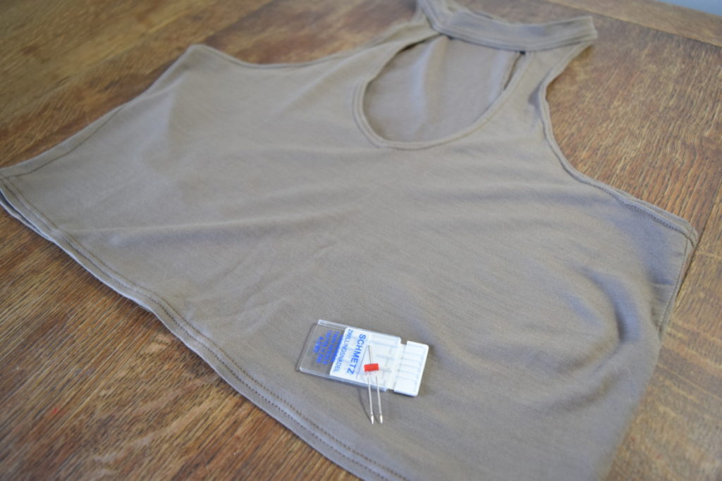 knit crop top hemmed with a double needle