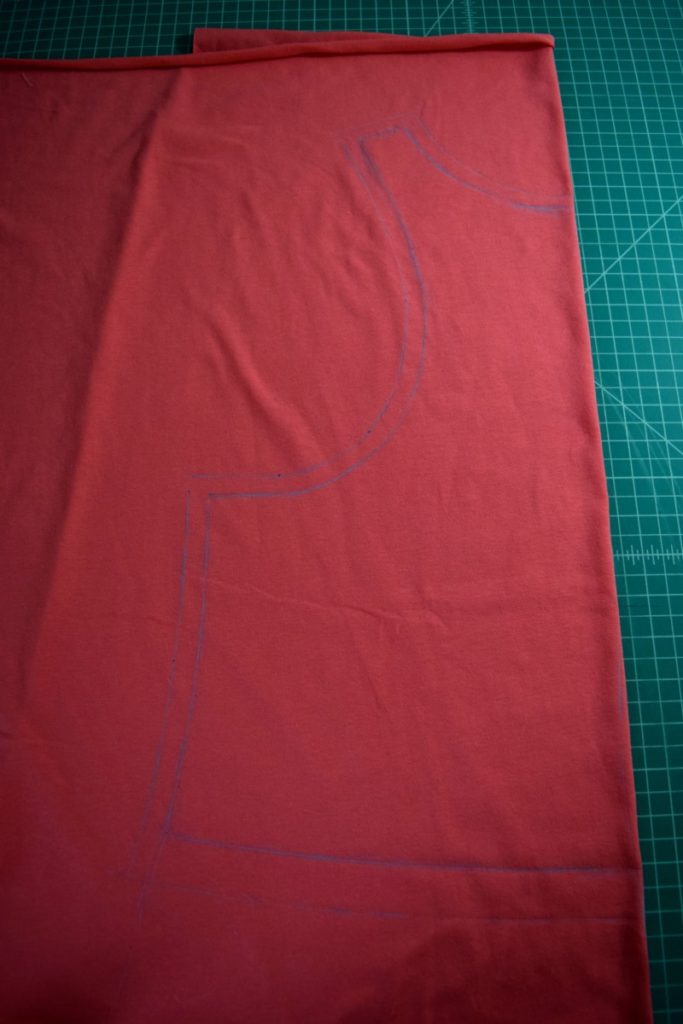 fold the fabric along the center back line