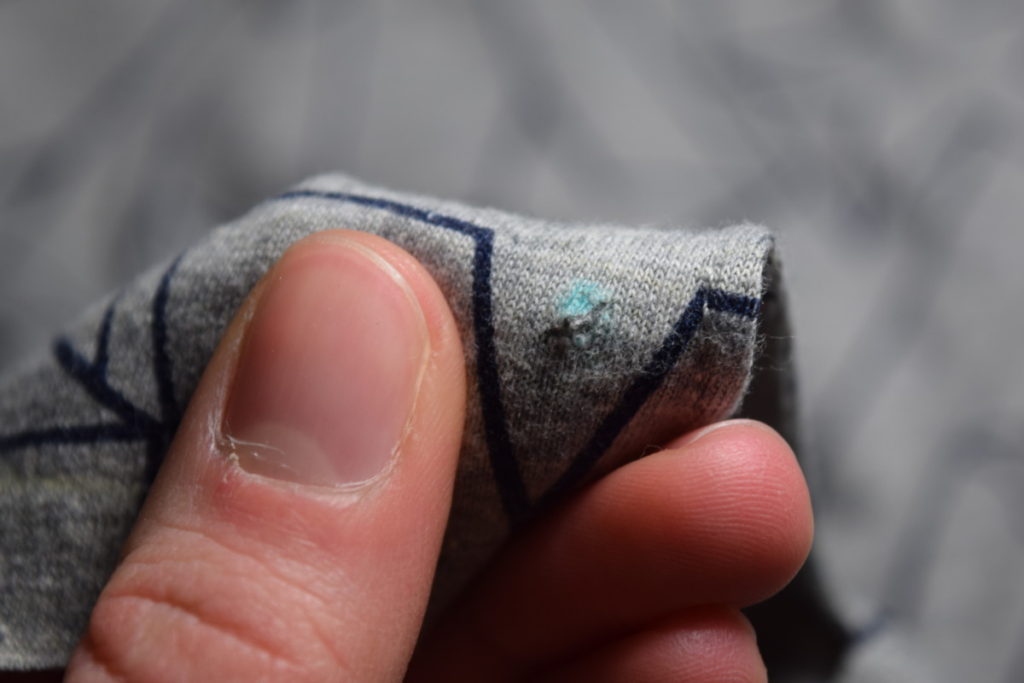 make a small hole in one of your eyelet marks