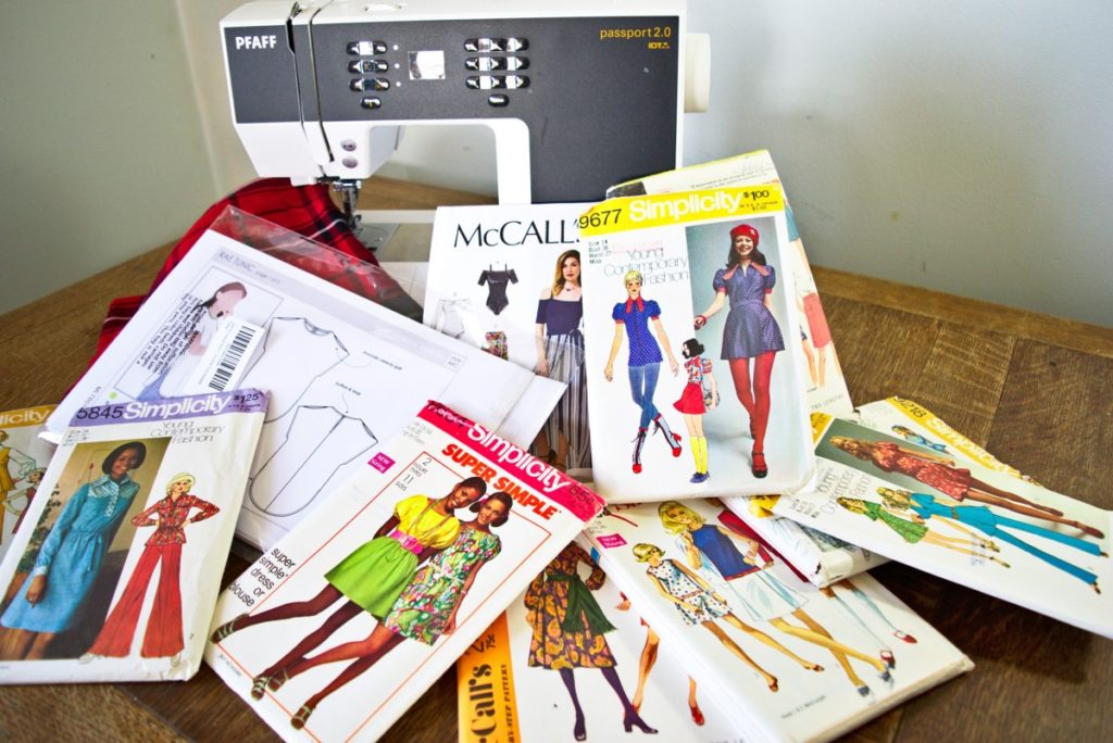 a pile of sewing patterns
