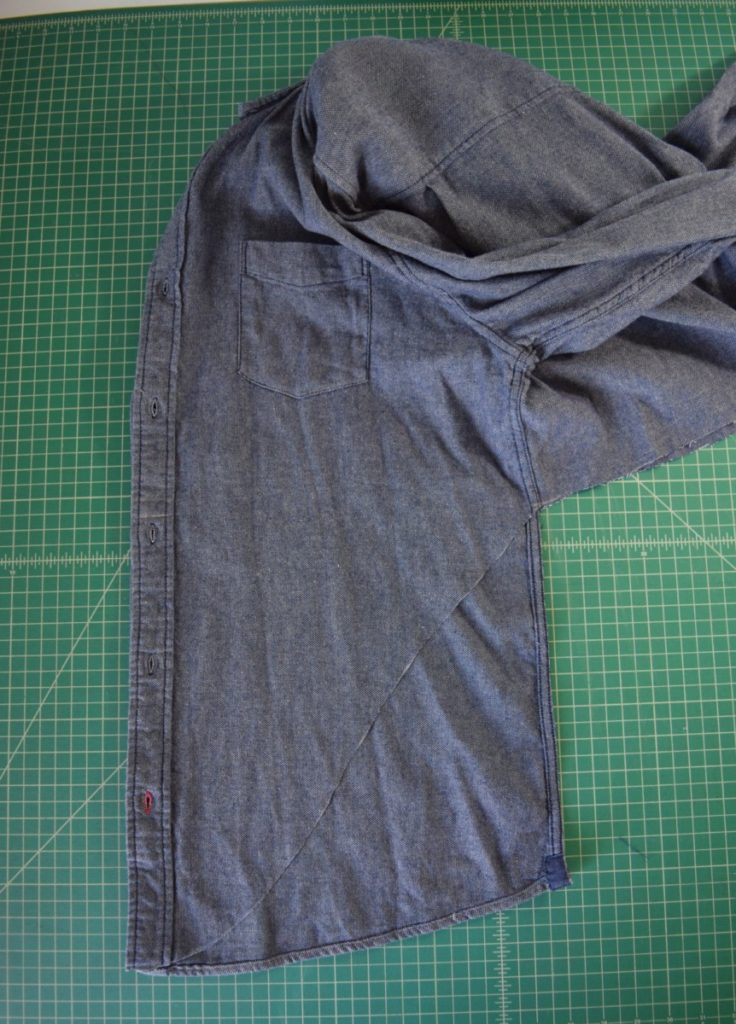 fold the shirt, matching center fronts and side seams