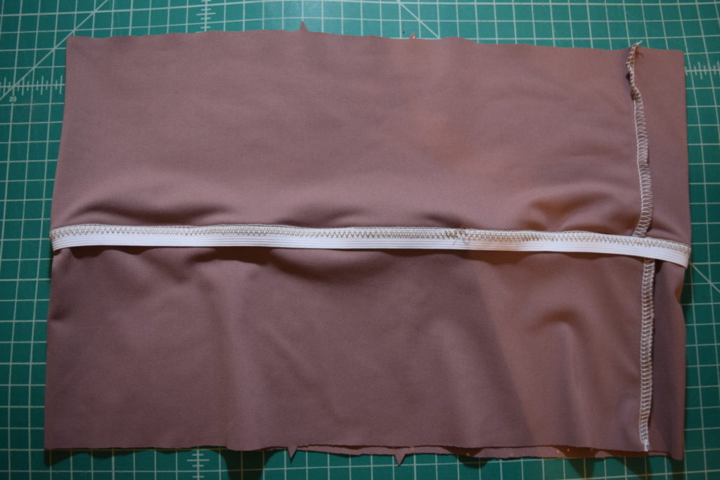 inside of waistband with elastic topstitched to one side