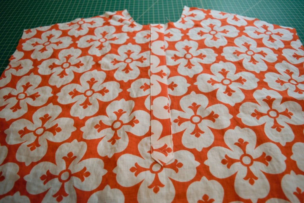 popover placket sewn on the front pattern piece