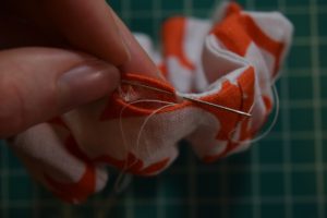 hand sewing a scrunchie closed step 3