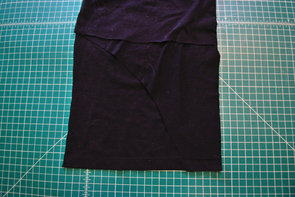 t shirt folded in half with the cut side on top