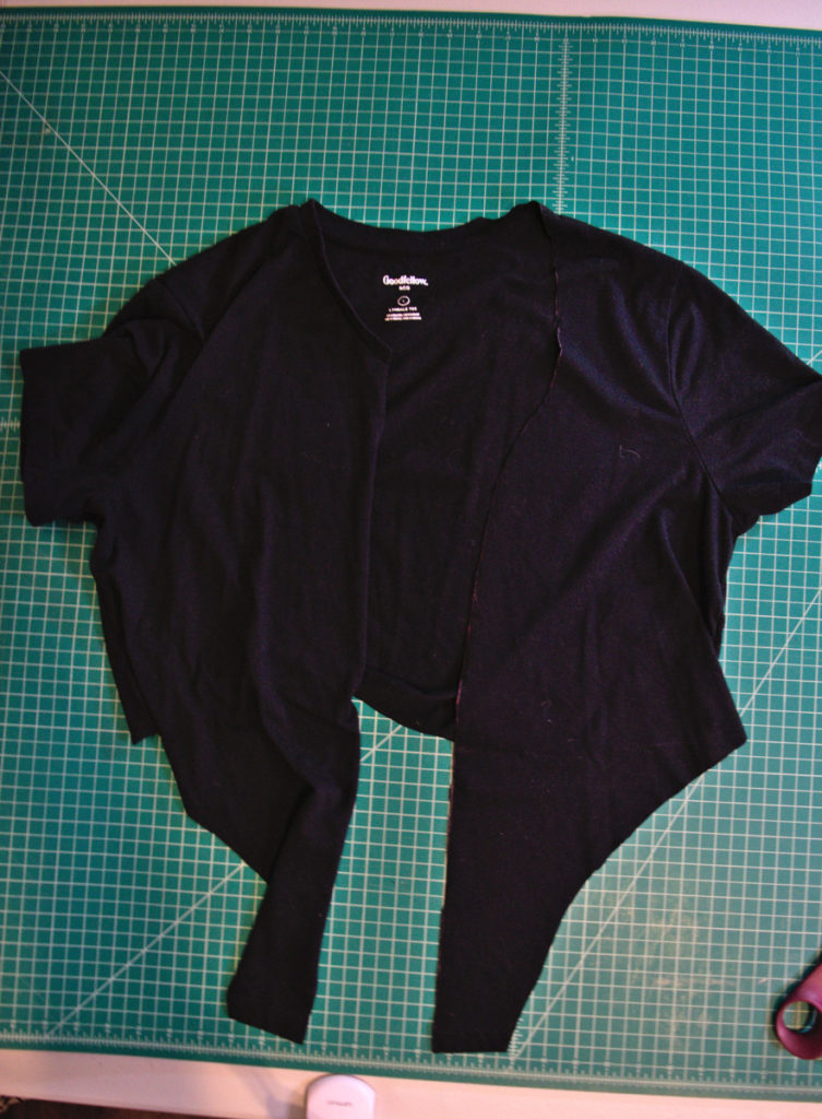 cut one side of the neckline of the refashioned t shirt