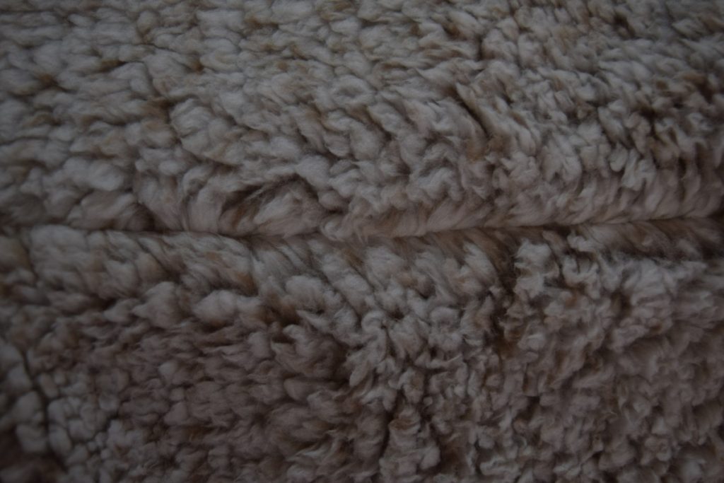 teddy bear fleece seam before picking the fur out of the seam