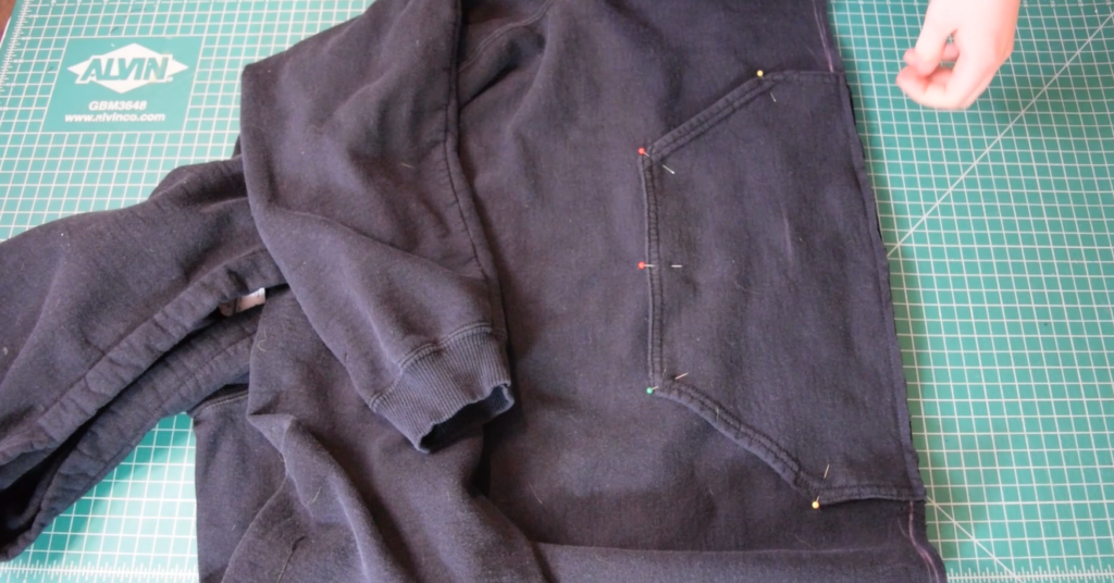 pocket is pinned onto the cropped hoodie
