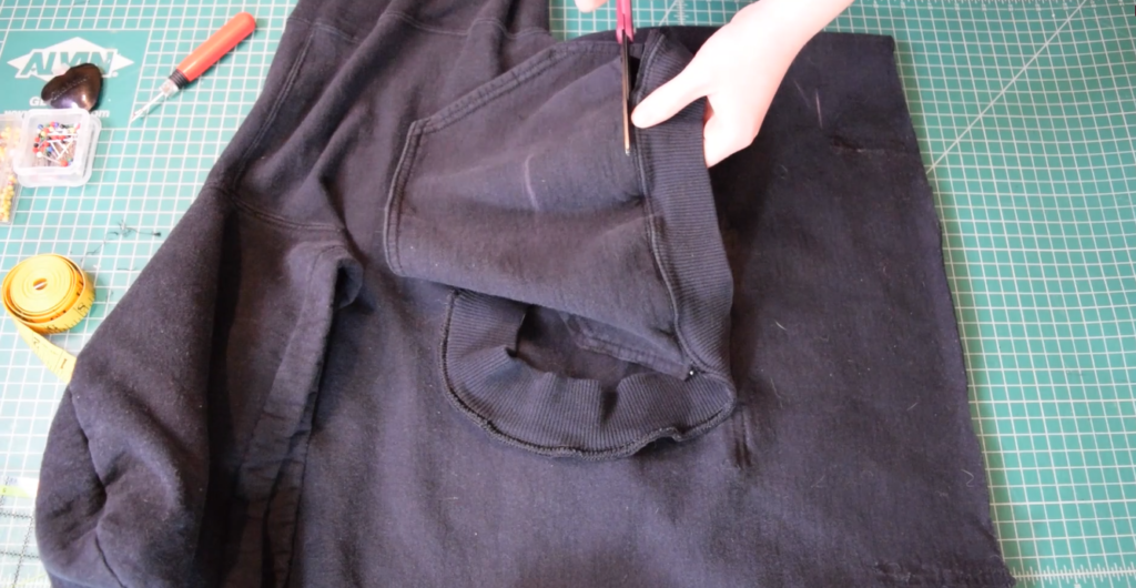 cutting the ribbing off the bottom edge of the pocket