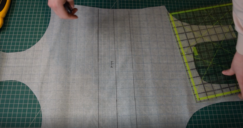 a line is drawn above and below the waist on the one piece swimsuit pattern